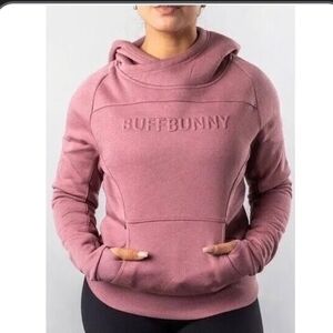 Buffbunny Embossed Spellout Beyond Cowlneck Hoodie in a pink color, made of a co